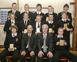 Mr. Raymond Cassidy, Guest Speaker congratulates Music pupils at the Abbey Grammar for a variety of numerous extra-curricular events throughout the school year. Included are Michael Corcoran, Garrett OHare, Kilian Foy, Cormac Boyle, Dermot Markey, Niall OFlaherty, Declan Magee, Daniel Sutherland, Benjamin Reynolds, Ryan Cunningham, Fergal Boyle, Niall Burke and Ronan Kearney.